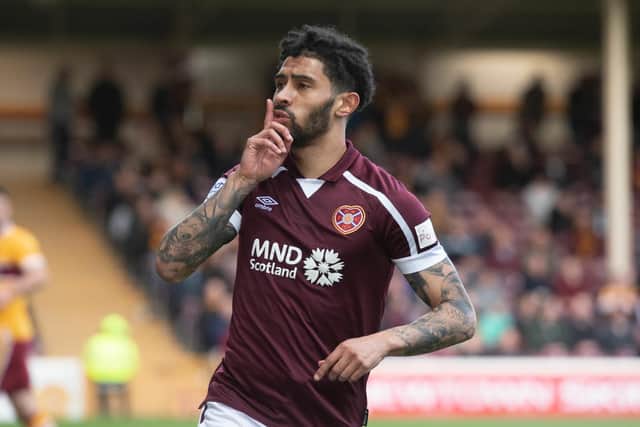 Josh Ginnelly celebrates having equalised for Hearts early in the match. Picture: SNS