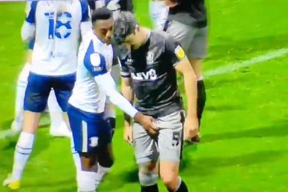 Preston North End's Darnell Fisher grabs hold of Callum Paterson's genitals during Sheffield Wedneday's 1-0 defeat at Deepdale this afternoon.