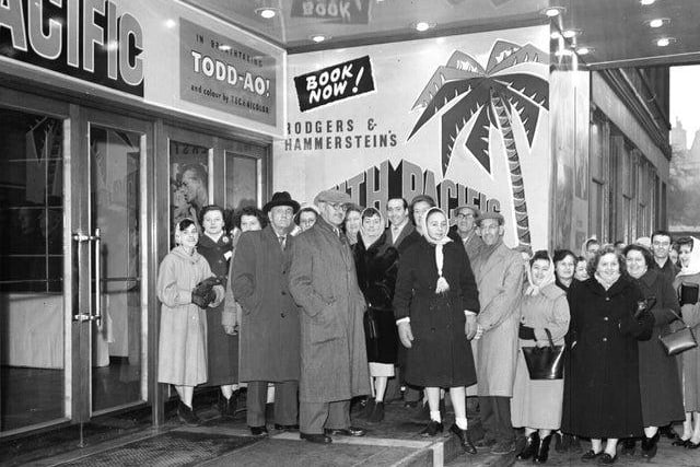 United Wire Works employees queue outside New Victoria cinema for a special showing of the film South Pacific in January 1959. The cinema was rebranded as Odeon in the 1960s.