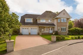 As you approach the property, you'll immediately notice its striking presence within a quiet and desirable development. Externally, the property offers ample parking with a multiple car driveway.
