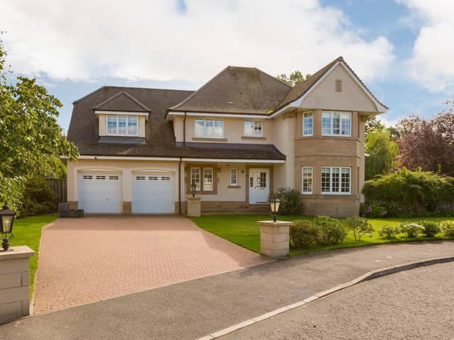As you approach the property, you'll immediately notice its striking presence within a quiet and desirable development. Externally, the property offers ample parking with a multiple car driveway.