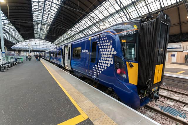 The Edinburgh to Glasgow service boost is part of timetable change across Scotland by Scotrail. Stock photo of a Scotrail train at Queen Street Station, Glasgow.