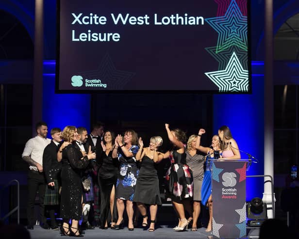 Representatives from Xcite pick up the Learn to Swim Provider of the Year award at Scottish Swimming's annual awards night.