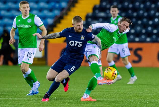 Scott Allan and Kilmarnock midfielder Alan Power battle for the ball during the last meeting between the two teams