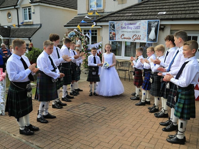 Herald Callum Roseburgh collects Queen Connie Gibb from her home. Photo by Joe Gilhooley LRPS.