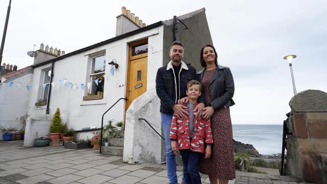 Hannah and John, the owners of Jonah Cottage in East Lothian, with their son, Samson. (Picture credit: Rory Dunning)