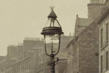 An 1883 photograph of the High Street was used to help design the new lamps to replicate how Scotland Street would have looked in the early 19th century.