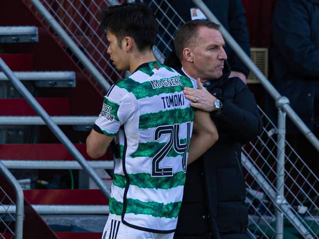 Celtic's Tomoki Iwata with manager Brendan Rodgers after being subbed off against Motherwell last weekend. (Photo by Craig Foy / SNS Group)