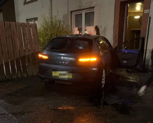 The car struck a property at Stenhouse Cross.