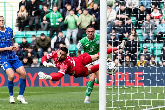 Lewis Miller heads home Hibs' opener in the 2-0 win over St Johnstone on September 23. (Photo by Ross Parker / SNS Group)