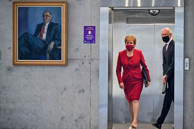 First Minister Nicola Sturgeon and deputy first minister John Swinney arrive for the statement at the Scottish Parliament in Edinburgh. Picture: Jeff J Mitchell/PA Wire