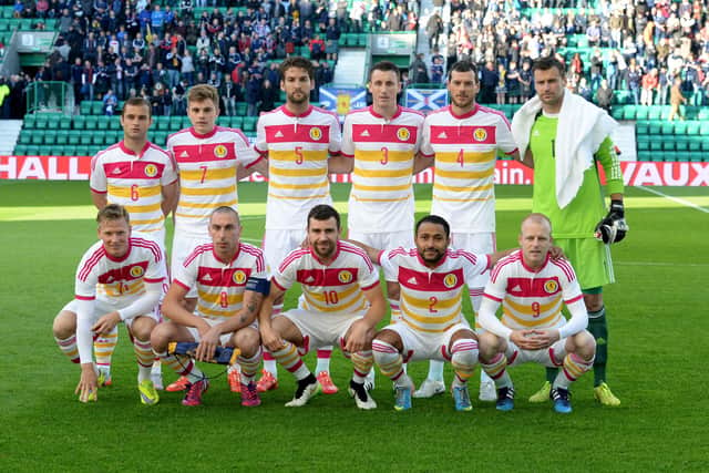 Marshall and Steven Naismith, back right and front right, line up ahead of Scotland's friendly with Qatar at Easter Road in June 2015