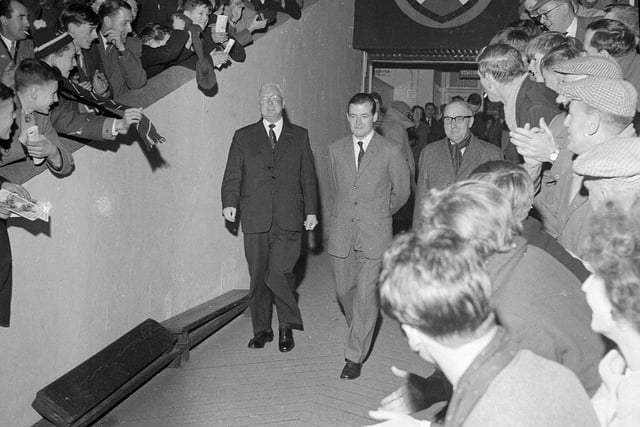 Willie Bauld is cheered by fans at his Hearts v Sheffield testimonial game at Tynecastle during his last season before retiring in 1962.