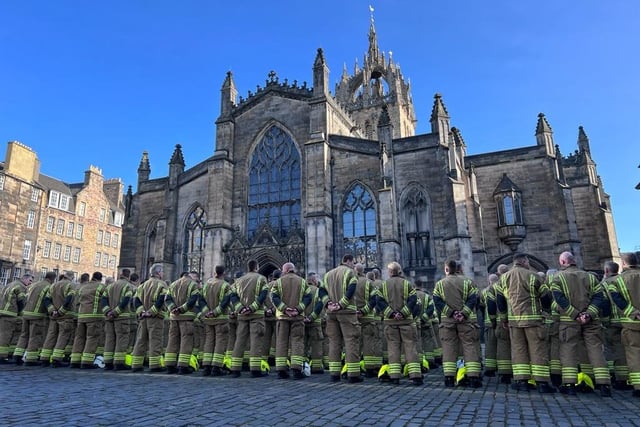 Officers from the SFRS lined up outside the Cathedral.