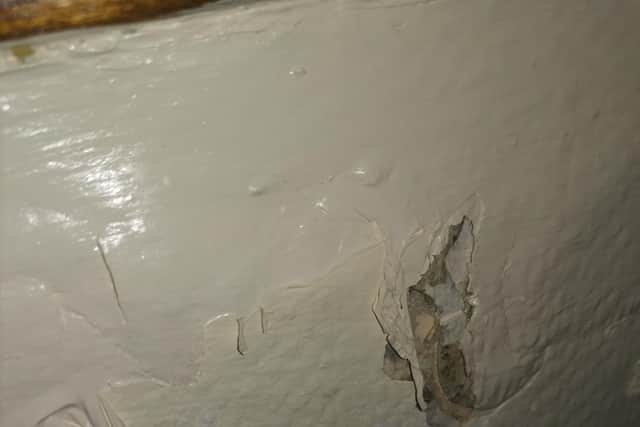 Wall paint coming off in Lisa's flat due to ongoing damp problems in the property picture: Lisa Brown