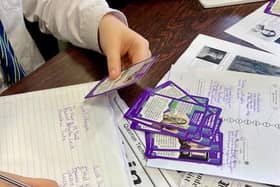 S4 students at Lenzie Academy interact with the Suffragette Trumps Cards and Education Pack.