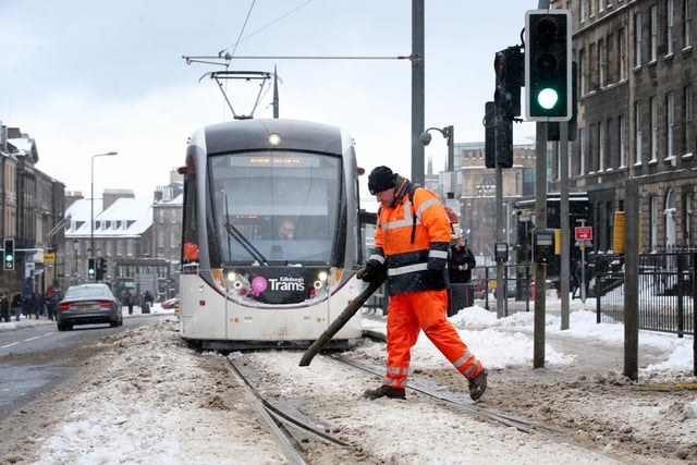 Engineers were forced to clear snow and ice from the tram lines along York Place in Edinburgh, as the Beast from the East continued to bring severe weather conditions to the Capital in early March.