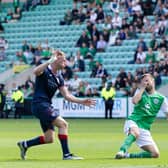Dylan Vente holds his face after being caught in the face by Liam Dick's boot in the closing stages of Hibs' 2-1 Viaplay Cup victory over Raith Rovers. Picture: Ross Parker / SNS Group