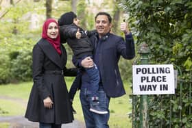 Scottish Labour party leader Anas Sarwar, with wife Furheen and son Ailyan, arrives to deliver his postal vote in the Scottish Parliamentary election at Pollokshields Burgh Hall in Glasgow.