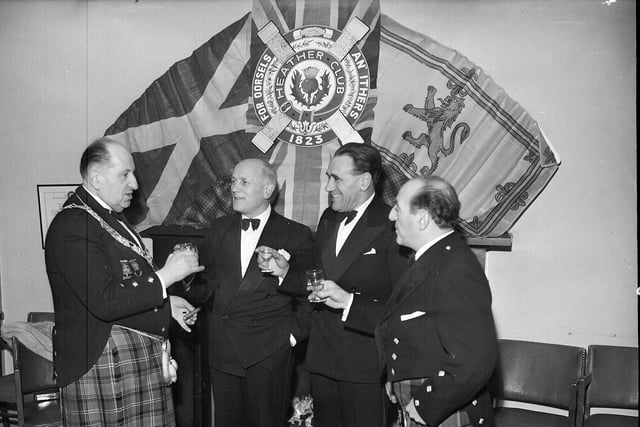 Four Edinburgh men enjoy a chat and a dram of whisky at the Heather Club Burns Supper in 1963.