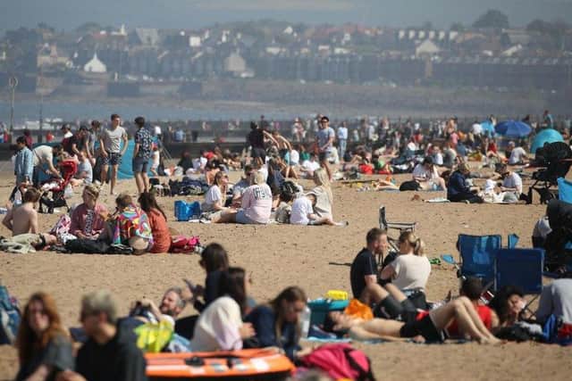 Summer in the Capital to continue for another day as temperatures are forecast to climb even higher than bank holiday Monday (Credit: Andrew Milligan)