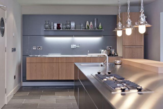 The kitchen is found in the lower ground level, and is a bespoke design that is paired with a spacious dining room that leads into the garden. The room benefits from glass fronted sliding doors to allow for al fresco dining