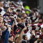 Most football supporters prefer to hold their scarves outstretched above their heads, like Hibs and Celtic. Hearts supporters, however, prefer to grip both ends together and twirl in the air. It's an impressive sight when thousands are doing so in unison.