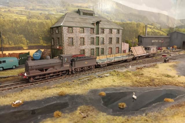 Overview of the United Mills yard with a train ready to depart.