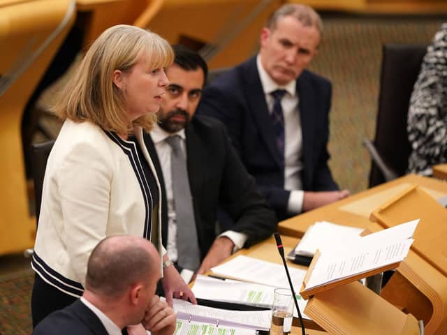 First Minister Humza Yousaf alongside Deputy First Minister Shona Robison as she outlines the draft budget for 2024-25 in a statement to MSPs in the Scottish Parliament. Photo: Andrew Milligan/PA Wire