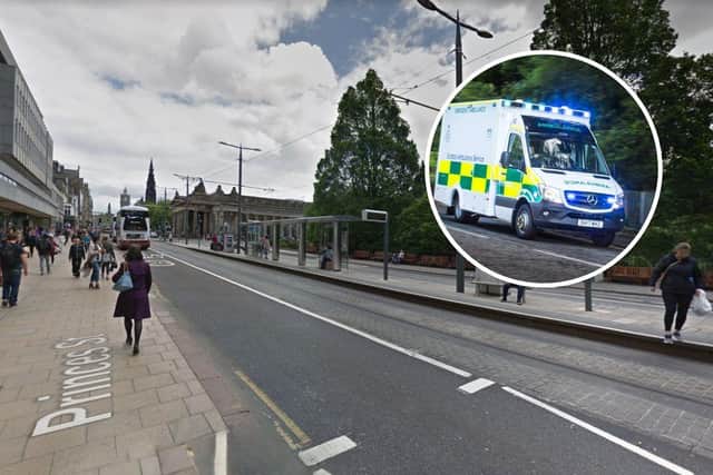 A woman has been taken to hospital after an incident on Princes Street in Edinburgh.