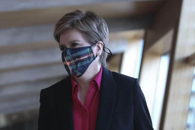 First Minister of Scotland Nicola Sturgeon arrives for First Minister's Questions at the Scottish Parliament in Holyrood, Edinburgh. Picture date: Thursday December 9, 2021.