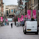 An almost empty Buchanan Street in the centre of Glasgow as people observe the spring 2020 lockdown. Non-essential stores were forced to close for months at the end of last year, hammering trade, but industry leaders had been hoping for a lift from April 26. Picture: John Devlin