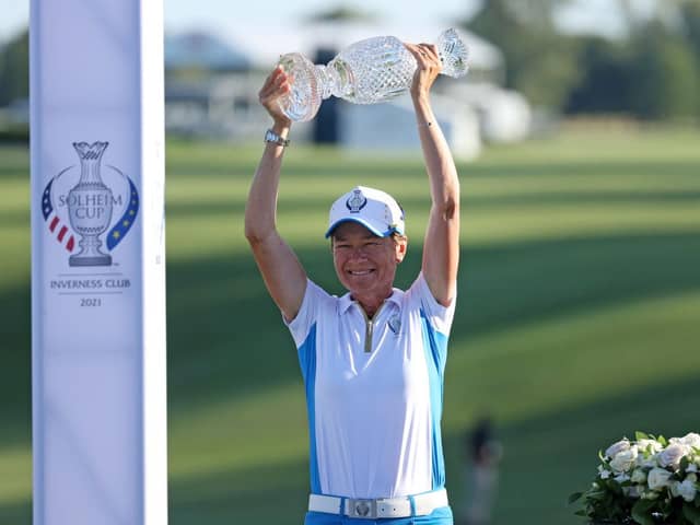 Team Europe captain Catriona Matthew lifts the Solheim Cup aloft after her second success in the event in last year's match at the Inverness Club in Toledo, Ohio. Picture: Gregory Shamus/Getty Images.