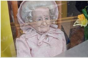 Another 'creepy' doll has appeared in an Edinburgh shop window – this time at the Marie Curie charity store in Morningside. Photo: Gordon McDonald