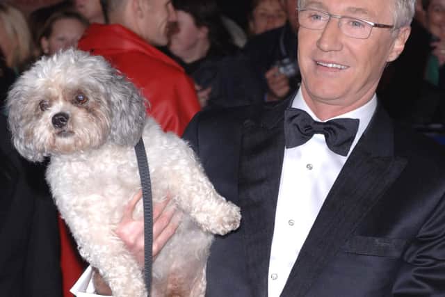 Paul O'Grady and his dog Buster arriving for the National Television Awards 2005 (NTA),