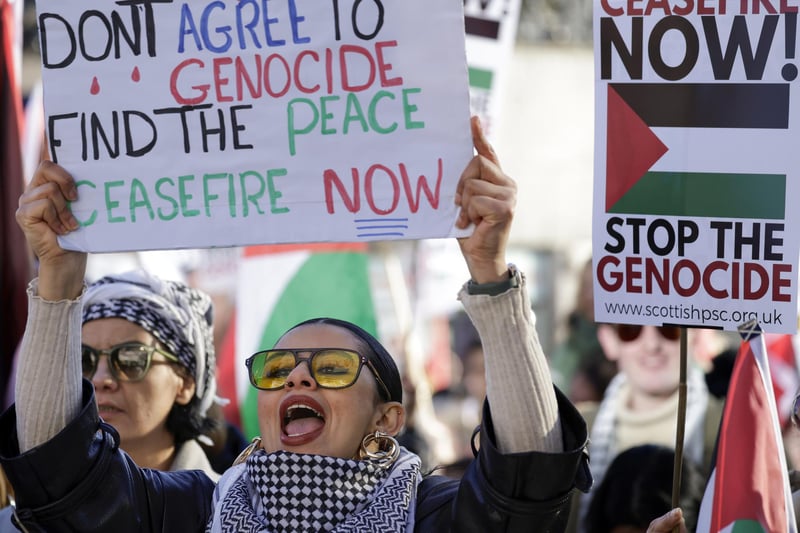 Pro-Palestinian march demanding a ceasefire in the Israel-Hamas war and an end to bombing in Gaza,. The march was held on Armistice Day, 105 years since the end of World War I. 
Photo by Jeff J Mitchell/Getty Images