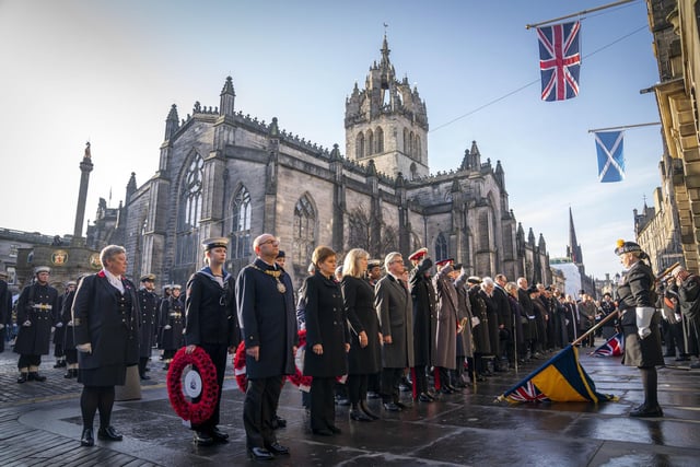 First Minister of Scotland Nicola Sturgeon and the Lord Provost of the City of Edinburgh Robert Aldridge, along with other dignitaries and members of the Armed Forces in front of the City Chambers.
Photo: Jane Barlow/PA Wire.