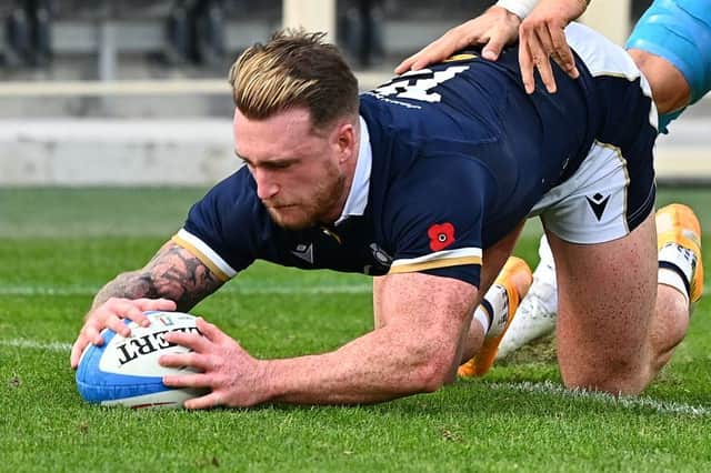 Scotland's full back Stuart Hogg grounds the ball over his own line under pressure from Italy's centre Federico Mori during the Autumn Nations Cup rugby union match on 14 November. (Pic: Getty Images)