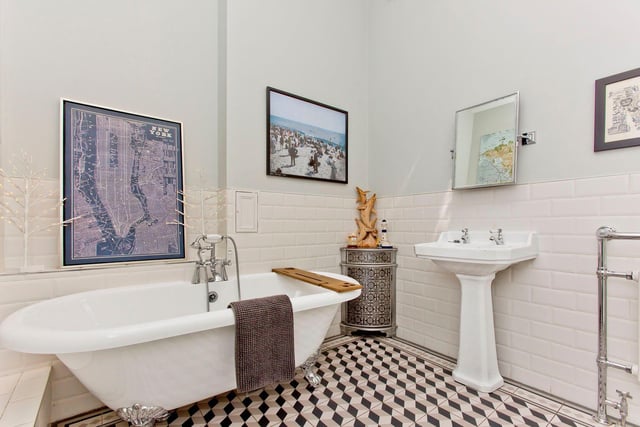One of the property's three bathrooms, stylish and eye-catching.