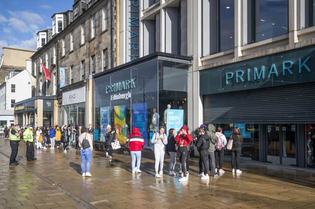 People queue outside the vast Primark store on Princes Street in Edinburgh, following its reopening during the summer. Picture: Jane Barlow/PA Wire