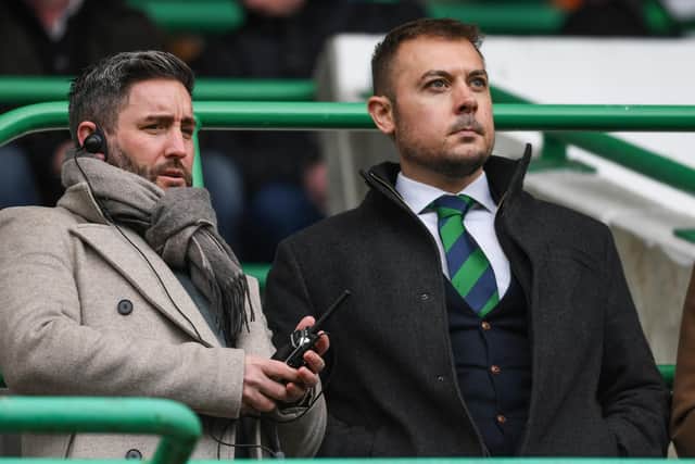 Lee Johnson watches on from the directors' box with chief executive Ben Kensell during Hibs' 3-1 defeat by Motherwell
