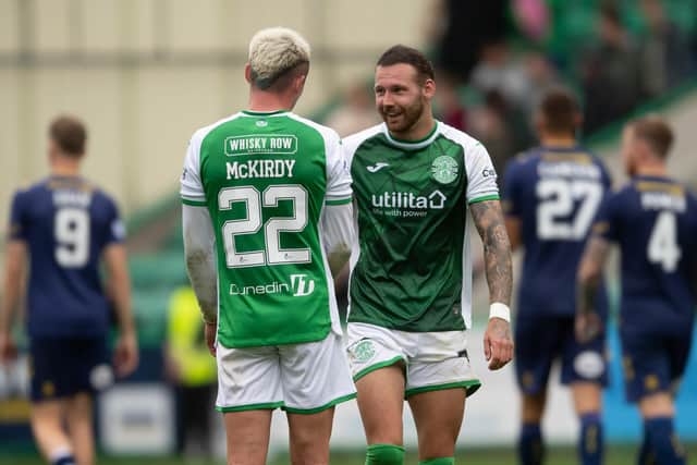 Hibs' Martin Boyle and new signing Harry McKirdy share a joke at full-time.