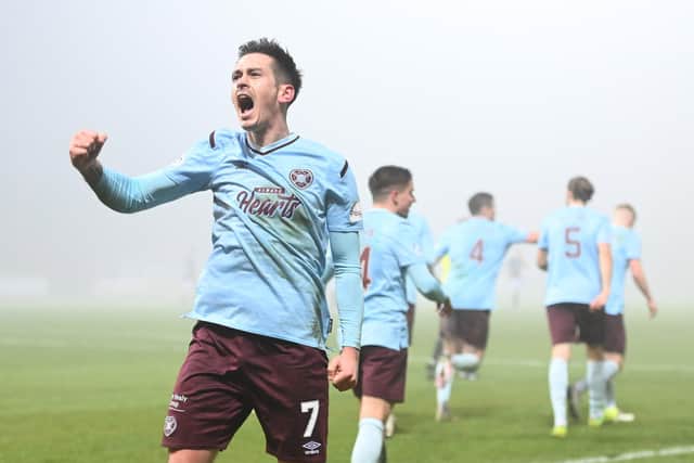 Jamie Walker celebrates in front of the Hearts fans after coming off the bench for a rare appearance to score the winner