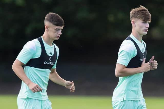 The MacIntyres take part in first-team training at HTC