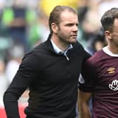 Robbie Neilson and Lawrence Shankland after full-time the last time Hearts visited Easter Road on league duty. Picture: SNS