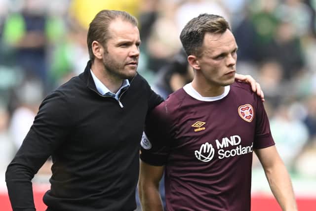 Robbie Neilson and Lawrence Shankland after full-time the last time Hearts visited Easter Road on league duty. Picture: SNS