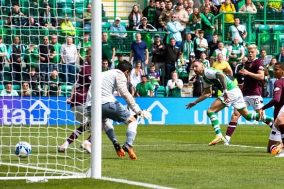Martin Boyle tucks the ball home in injury time to earn Hibs a point