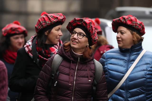 A Tourist Tax will help spread the benefits of Edinburgh's vibrant tourist economy to every part of the city (Picture: Andrew Milligan/PA Wire)