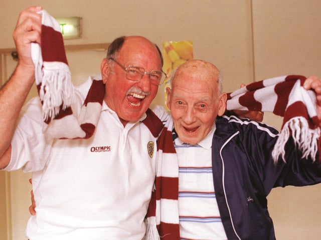 Hearts supporters in Merchiston Hearts Supporters Club who were at the 1956 cup final, the last time they won the famous old trophy. Fom left Harry Hay and George Ramsey celebrate Hearts beating Rangers 2-1 to win the Tennents Scottish Cup in 1998.