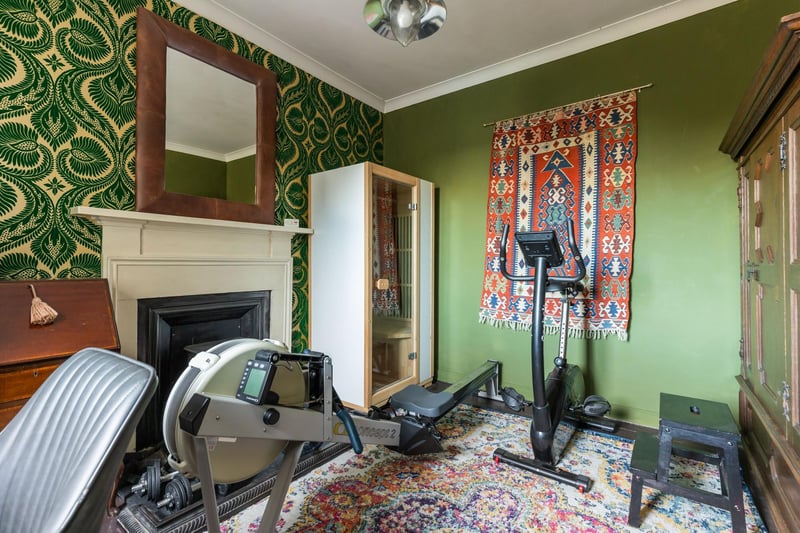 This fourth bedroom is currently used as a gym.